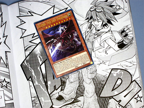 Yu-Gi-Oh! ARC-V manga panel in the Weekly Shonen Jump Fall 2017 Jump Pack and a Slifer the Sky Dragon promo card